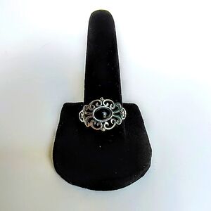 Size 7 1/2 sterling silver .925 black stone ring..